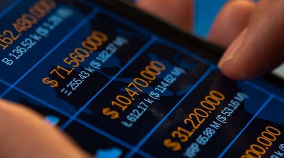 image shows cellphone with trading apps