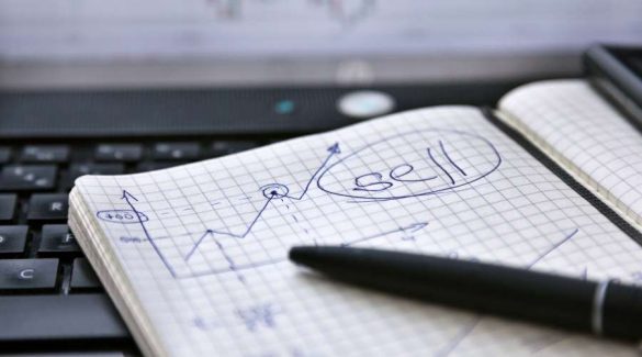 image shows notebook with trading